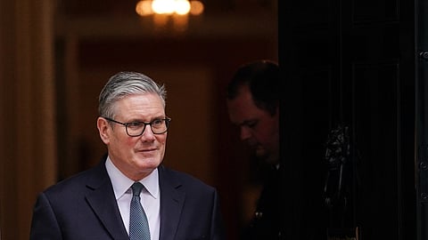 Britain's Prime Minister Keir Starmer leaves 10 Downing Street to welcome President Prabowo Subianto of Indonesia and after Britain's government has approved a massive new Chinese Embassy in central London in London, Tuesday, Jan. 20, 2026