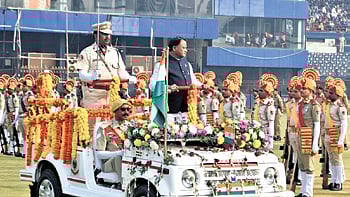 CM Mohan Charan Majhi inspects the R-Day parade at Barabati Stadium.