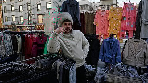 A vendor waits for customers at Tajrish Square in Tehran, Iran, Tuesday, Jan. 27, 2026.