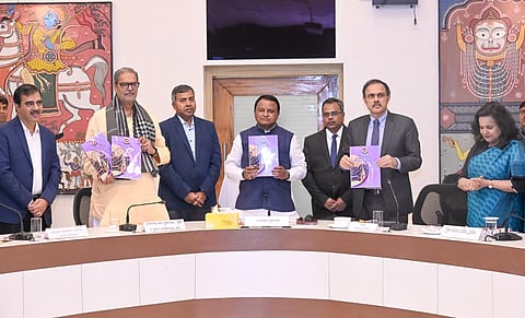 CM Mohan Charan Majhi with the 6th SFC report at Lok Seva Bhawan. Dy CM KV Singh Deo is also present.