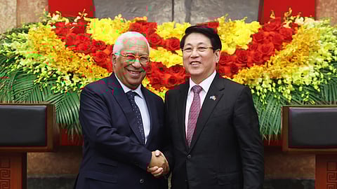 European Council President Antonio Costa, left, and Vietnamese President Luong Cuong shake hands in Hanoi, Vietnam, Thursday, Jan. 29, 2026.