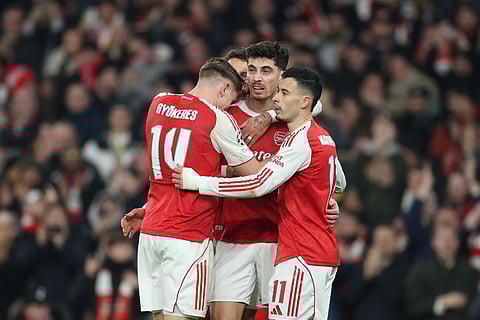 Arsenal's Kai Havertz, center, celebrates after scoring his side's second goal during the Champions League opening phase soccer match between Arsenal and Kairat Almaty in London, Wednesday, Jan. 28, 2026. 