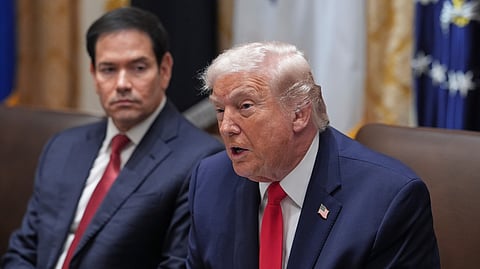 President Donald Trump speaks as Secretary of State Marco Rubio listens during a cabinet meeting at the White House, Thursday, Jan. 29, 2026, in Washington. 