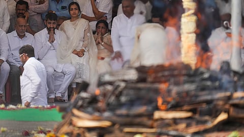 : Maharashtra Deputy Chief Minister Ajit Pawar's wife Sunetra Pawar, 4th from left, and son Jay Pawar, 2nd from left, during his funeral, at Baramati in Pune district, Thursday, Jan. 29, 2026