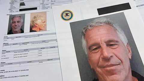 Documents that were included in the U.S. Department of Justice release of the Jeffrey Epstein files are photographed Friday, Jan. 2, 2026.