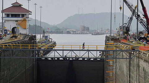 FILE - Workers carry out maintenance at the Pedro Miguel locks of the Panama Canal during routine upkeep in Panama City, Friday, May 30, 2025