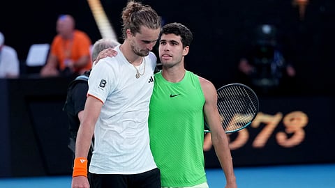 Carlos Alcaraz, right, of Spain is congratulated by Alexander Zverev, left, of Germany following their semifinal match at the Australian Open tennis championship in Melbourne.