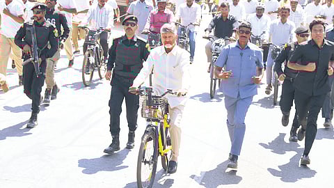 Chief Minister Chandrababu Naidu rides an e-cycle in Kuppam on Saturday