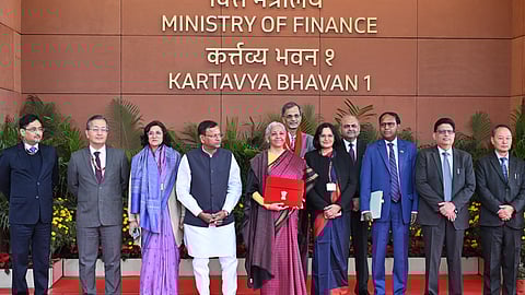 Union Finance Minister Nirmala Sitharaman with Union Minister of State for Finance Pankaj Chaudhary and other officials outside the Finance Ministry ahead of the presentation of the 'Union Budget 2026-27 at Ministry of Finance Kartavya Bhavan in New Delhi on Sunday.