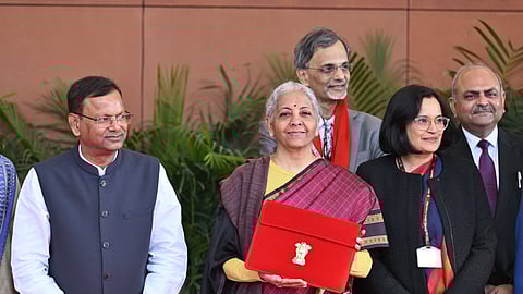 Union Finance Minister Nirmala Sitharaman with Union Minister of State for Finance Pankaj Chaudhary and other officials outside the Finance Ministry ahead of the presentation of the 'Union Budget 2026-27 at Ministry of Finance Kartavya Bhavan in New Delhi on Sunday.
