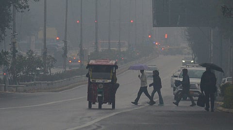 Rain lashes Delhi-NCR, temperature drops as IMD issues red alert.