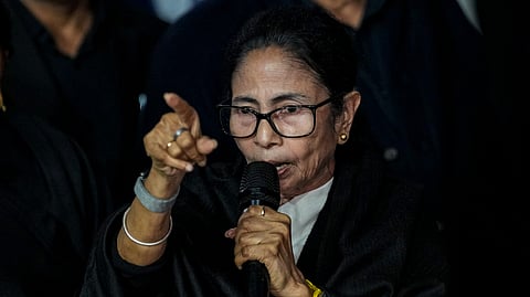 West Bengal Chief Minister Mamata Banerjee addresses the media along with some SIR-affected families and party leaders outside the Election Commission office, in New Delhi, Monday, Feb. 2, 2026..