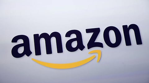 The Amazon logo is displayed at a news conference in New York on Sept 28, 2011