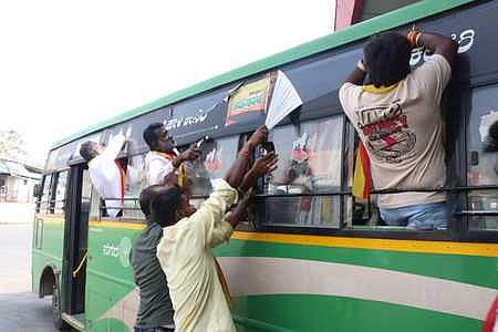 The activists of Karnataka Rakshana Vedike Simhasene seen removing surrogate gutka advertisements pasted on KSRTC buses at KSRTC Bus Stand in Shivamogga.