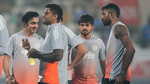 Head coach Gautam Gambhir, left, interacts with the players ahead of the fourth T20 cricket match between India and New Zealand in Visakhapatnam, India, Wednesday, Jan. 28, 2026.