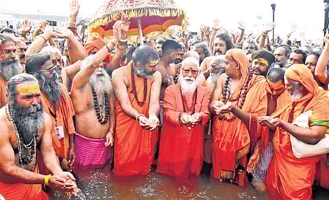Hindu monks and devotees led by festival sabhapati Mahamandaleshwar Swami
Anandavanam Bharati taking a holy dip in Bharathapuzha on the final day of Mahamagha Mahotsavam on Tuesday 