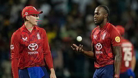 England's captain Harry Brook, left, talks with Jofra Archer during the first T20 cricket match between England and Sri Lanka in Pallekele, Sri Lanka, Friday, Jan. 30, 2026.