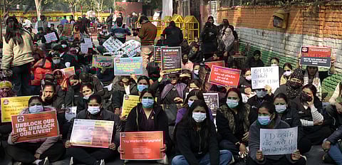 Gig and Platform Service Workers Union members hold a protest, at Jantar Mantar in New Delhi, Tuesday.