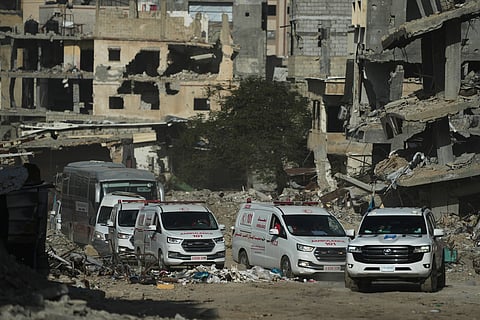 A U.N. vehicle escorts ambulances and a bus carrying Palestinian patients in Khan Younis as they travel to the Rafah crossing to leave the Gaza Strip for medical treatment abroad, Tuesday, Feb. 3, 2026.