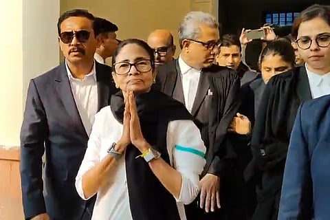 West Bengal CM Mamata Banerjee reaches the Supreme Court premises, in New Delhi, Wednesday, Feb. 4, 2026. The Supreme Court will hear a plea filed by Mamata Banerjee challenging the ongoing Special Intensive Revision (SIR) of electoral rolls in the state. 