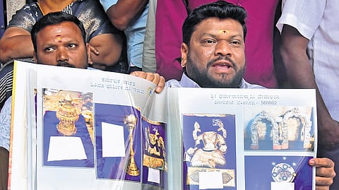 Former president of Dharmaraya Temple Satish addresses the media regarding theft of a gold ornament inside the temple, in Bengaluru on Tuesday.