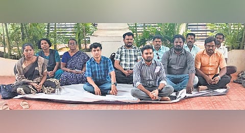 Teaching fellows working at Anna University’s Madurai regional centre staged a sit-in protest inside the campus on Thursday 