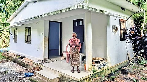 Chakki Amma in front of her house in Mavoor, Kozhikode