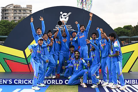 U19 India team with the trophy