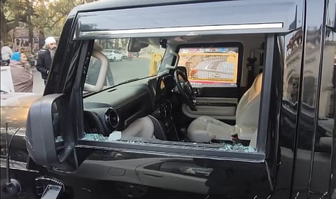 A Thar vehicle with shattered glass, belonging to Aam Aadmi Party leader Lucky Oberoi, is seen outside a gurudwara where Oberoi was shot dead by unidentified assailants, at Model Town area, in Jalandhar, Punjab, Friday, Feb. 6, 2026.