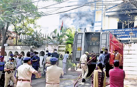 Firefighters in action at the state Forensic Science Laboratory at Lakdikapul in Hyderabad on Saturday, where a fire allegedly damaged digital and physical evidence linked to several cases.
