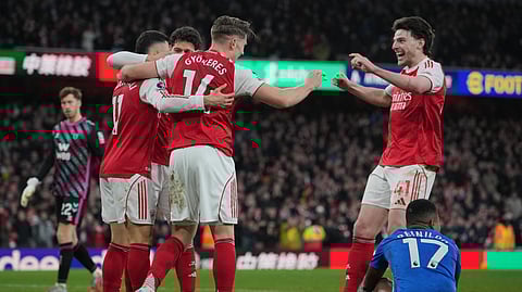 Arsenal players celebrate after a goal during the English Premier League soccer match between Arsenal and Sunderland in London, England, Saturday, Feb. 7, 2026. 