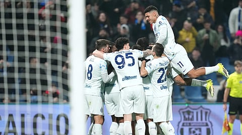 Inter Milan's Manuel Akanji celebrates after scoring their side's fourth goal of the game during the Serie A soccer match between Sassuolo and Inter in Milan, Italy, Sunday, Feb. 8, 2026.