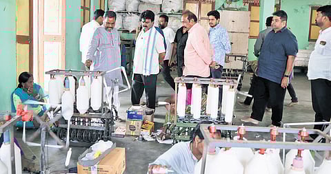 Amadalavalasa MLA Koona Ravi Kumar, along with the officials, inspecting the proposed site for the Khadi cluster at Ponduru in Srikakulam district.