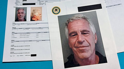 Documents that were included in the U.S. Department of Justice release of the Jeffrey Epstein files are photographed Friday, Jan. 2, 2026.
