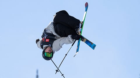 Hunter Hess, of the United States, executes a trick in the halfpipe finals during the World Cup U.S. Grand Prix freestyle skiing event in Copper Mountain, Colo., Dec. 17, 2022. 