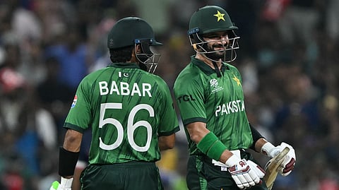 Pakistan's Sahibzada Farhan (R) and Babar Azam during the 2026 T20 World Cup match between Pakistan and USA at the Sinhalese Sports Club (SSC) Ground in Colombo.