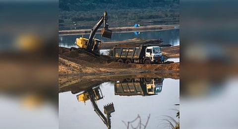 During the raid, officials found huge quantities of sand stored on the main road, causing inconvenience to commuters.