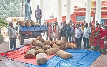 Farmers dumping paddy bags in front of the collectorate on Wednesday