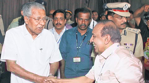 Chief Minister Pinarayi Vijayan greets businessman Ravi Pillai at the inaugural function of Ravi Pillai Academic Excellence Scholarship at Nishagandhi auditorium in Thiruvananthapuram on Wednesday 