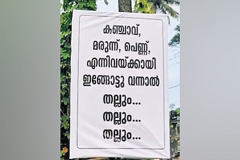 File pic of the warning board erected by residents before it was torn down