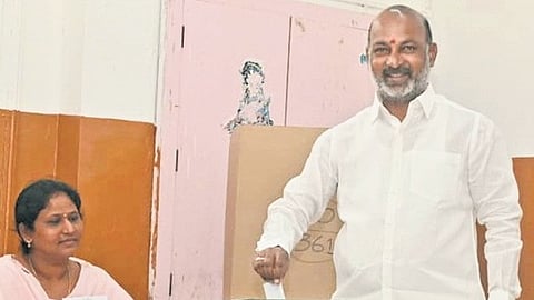 BJP state president N Ramchander Rao casting his vote during the Telangana municpal polls.