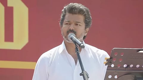 Tamilaga Vettri Kazhagam (TVK) chief Vijay addresses an election rally in Salem on Friday, Feb. 13, 2026.