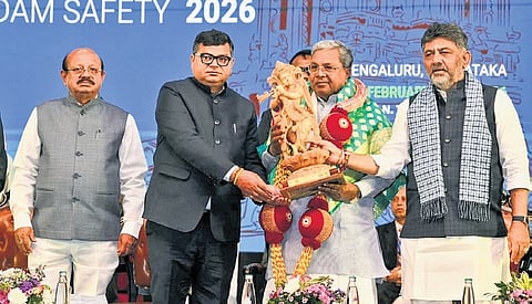 Chief Minister Siddaramaiah, Water Resources Minister DK Shivakumar and  Union Minister of State for Jal Shakti Raj Bhushan Chaudhary at the inauguration of the International Dam Safety Conference at IISc in Bengaluru on Friday.