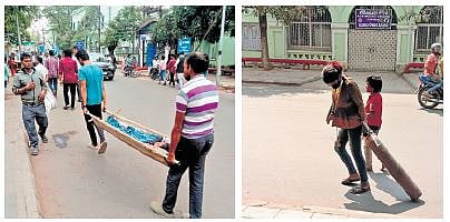 (Left) The 48-year-old man and his son carrying his ailing wife on a stretcher; Two boys carrying an oxygen cylinder by themselves at SCBMCH 