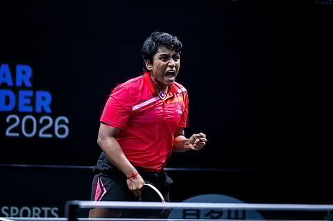 Nithya Mani celebrates a point on Friday