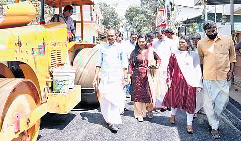 Mayor V V Rajesh and Deputy Mayor G S Asha Nath inspecting the road tarring work