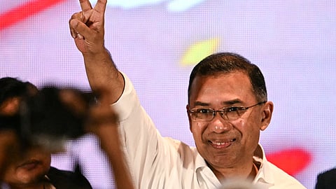 Bangladesh Nationalist Party (BNP) chairman Tarique Rahman shows victory sign after addressing a press conference in Dhaka on February 14, 2026.