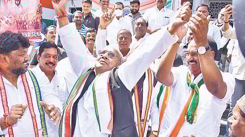 Congress leaders and cadre celebrate in Hyderabad on Friday.