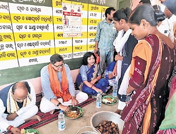 Kendrapara MP Baijayant Panda eats breakfast food prepared by Dalit cook in a local anganwadi centre 