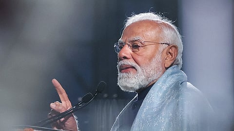 Prime Minister Narendra Modi speaks during an event in New Delhi, Feb. 13, 2026.